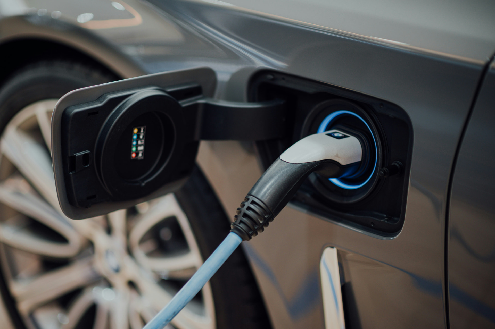 Electric car plugged in and charging